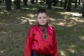 The boy in a red Russian shirt Royalty Free Stock Photo