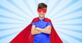 Boy in red super hero cape and mask Royalty Free Stock Photo
