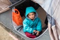 Boy in refugee camp in Greece Royalty Free Stock Photo