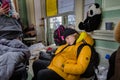 Boy refugee sleeping at Przemysl train station near the Ukraine border with Poland