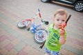 Boy repair bike. Little mechanic work with bicycle Royalty Free Stock Photo