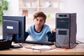 Boy reparing computers at workshop Royalty Free Stock Photo