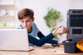 Boy reparing computers at workshop Royalty Free Stock Photo