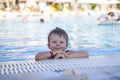 Boy resting in the pool Royalty Free Stock Photo