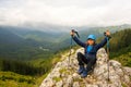 Boy resting on top of the cliff