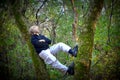 Boy Resting in Tree