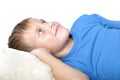 Boy rests upon pillow Royalty Free Stock Photo