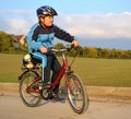 Boy ride a bike outside