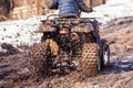 The boy is riding an ATV off-road Royalty Free Stock Photo