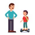 Boy riding a balancing electric gyroboard scooter Royalty Free Stock Photo