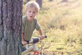 Boy riding a bike in the forest. Lifstyle concept