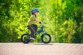 Boy riding bike in a helmet Royalty Free Stock Photo