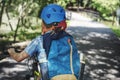 Boy riding a bike in the park Royalty Free Stock Photo