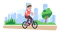 Boy riding bike in park. Happy cyclist. Healthy activity. City transportation. Outdoor sport. Eco transport. Young man Royalty Free Stock Photo