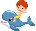 Boy riding dolphin Royalty Free Stock Photo