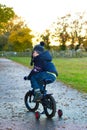Boy riding his bike through a countryside path Royalty Free Stock Photo