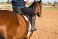 Boy riding a horse in the ranch Royalty Free Stock Photo