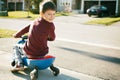 Boy riding scooter Royalty Free Stock Photo