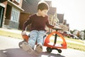 Boy riding scooter Royalty Free Stock Photo