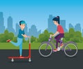 boy riding skateboard and girl cycling Royalty Free Stock Photo