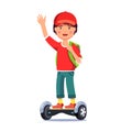 Boy riding a standing electric gyroboard scooter Royalty Free Stock Photo