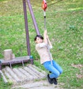 Boy riding a zip line Royalty Free Stock Photo