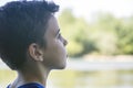 Boy on the riverbank