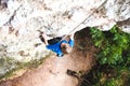 The boy is a rock climber. Royalty Free Stock Photo