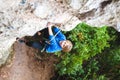 The boy is a rock climber. Royalty Free Stock Photo