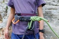 boy rock climber stands against the backdrop of a rock. children's sports in nature Royalty Free Stock Photo