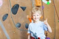 Boy rock climbing Royalty Free Stock Photo