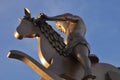 The boy on a rocking horse in Trafalgar Square, London, UK. Royalty Free Stock Photo