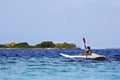 Boy rowing in sea kayak Royalty Free Stock Photo