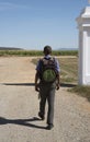 Boy with rucksack walking to school Royalty Free Stock Photo