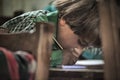 Boy in the only school in the village of Shimshal 3100m is a government school taught by teachers based in the village