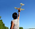 Boy running airplane model Royalty Free Stock Photo