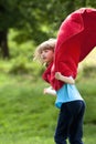 Boy Running Around in Red Towel