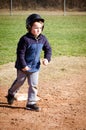 Boy running bases Royalty Free Stock Photo