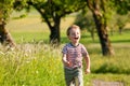 Boy running down a dirtpath Royalty Free Stock Photo