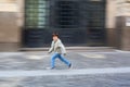 Boy running on street Royalty Free Stock Photo