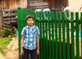 Boy on the rural country fence background Royalty Free Stock Photo