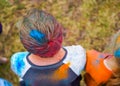 Boy's head in paint powder