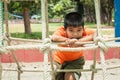 Boy sad alone at playground Royalty Free Stock Photo