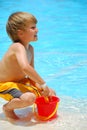 Boy with sand bucket Royalty Free Stock Photo