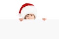 Boy in Santa hat with blank board Royalty Free Stock Photo