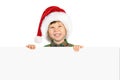 Boy in Santa hat with blank board Royalty Free Stock Photo