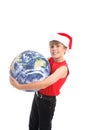 Boy in Santa hat with globe Royalty Free Stock Photo