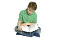 Boy sat reading a book.