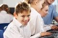 Boy in school class smiling to camera Royalty Free Stock Photo