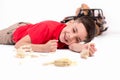 The boy the school student the brunette in a red t-shirt lies on Royalty Free Stock Photo